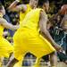 Michigan State junior Keith Appling is heavily defended by Michigan defenders on Sunday, Mar. 3. Daniel Brenner I AnnArbor.com